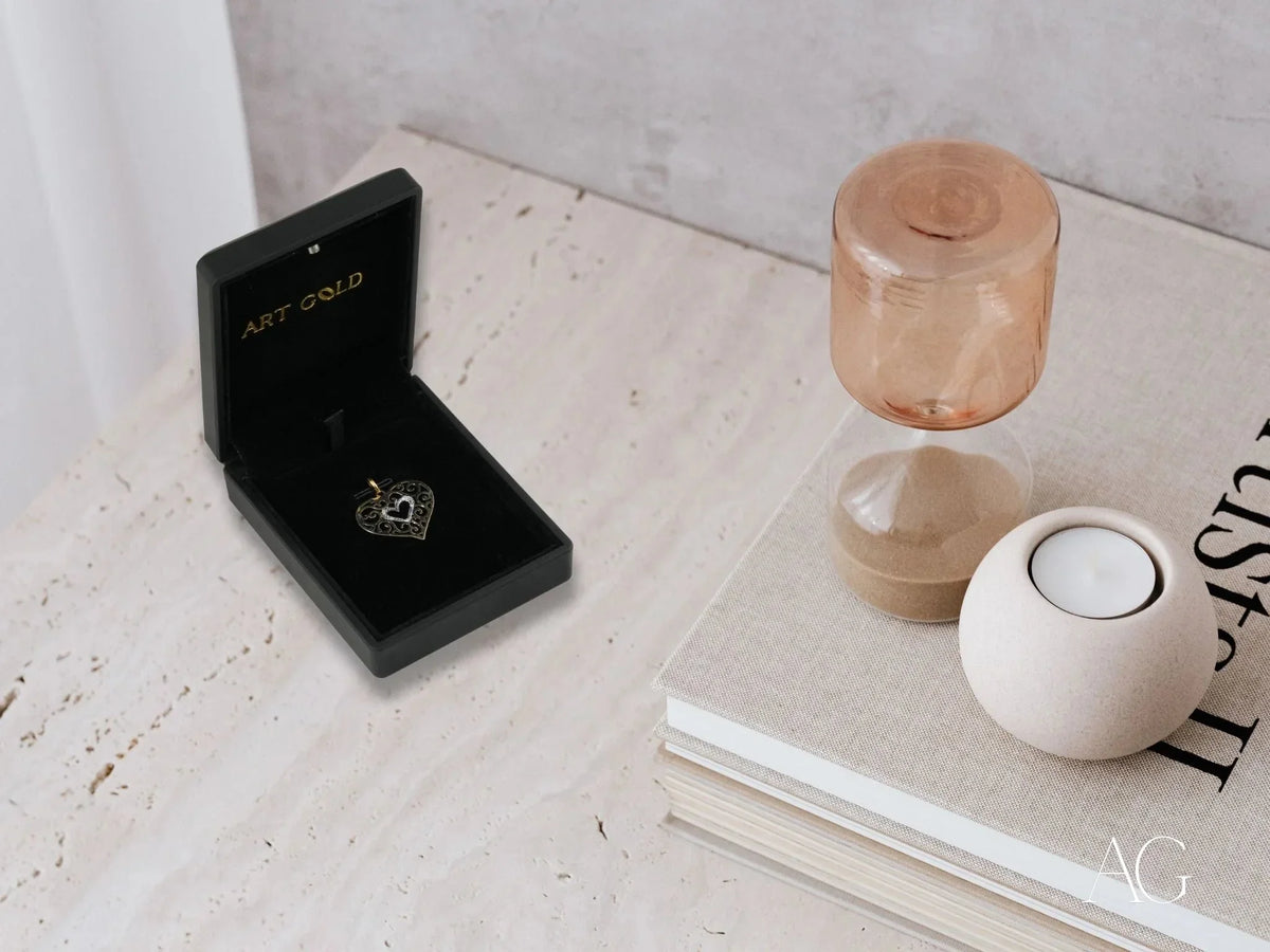 Open black velvet box with 18k solid gold double heart pendant