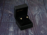 Geometric diamond earrings in certified 18k solid gold box