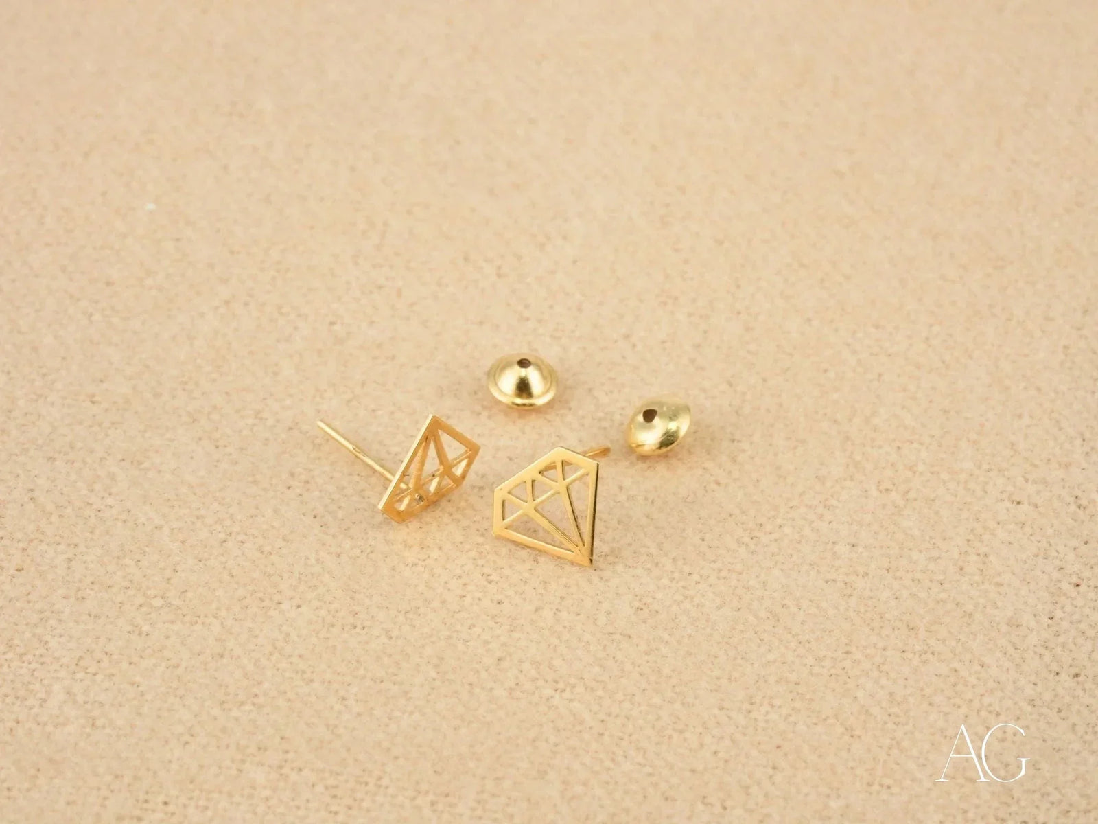Gold geometric diamond stud earrings in certified 18k solid gold