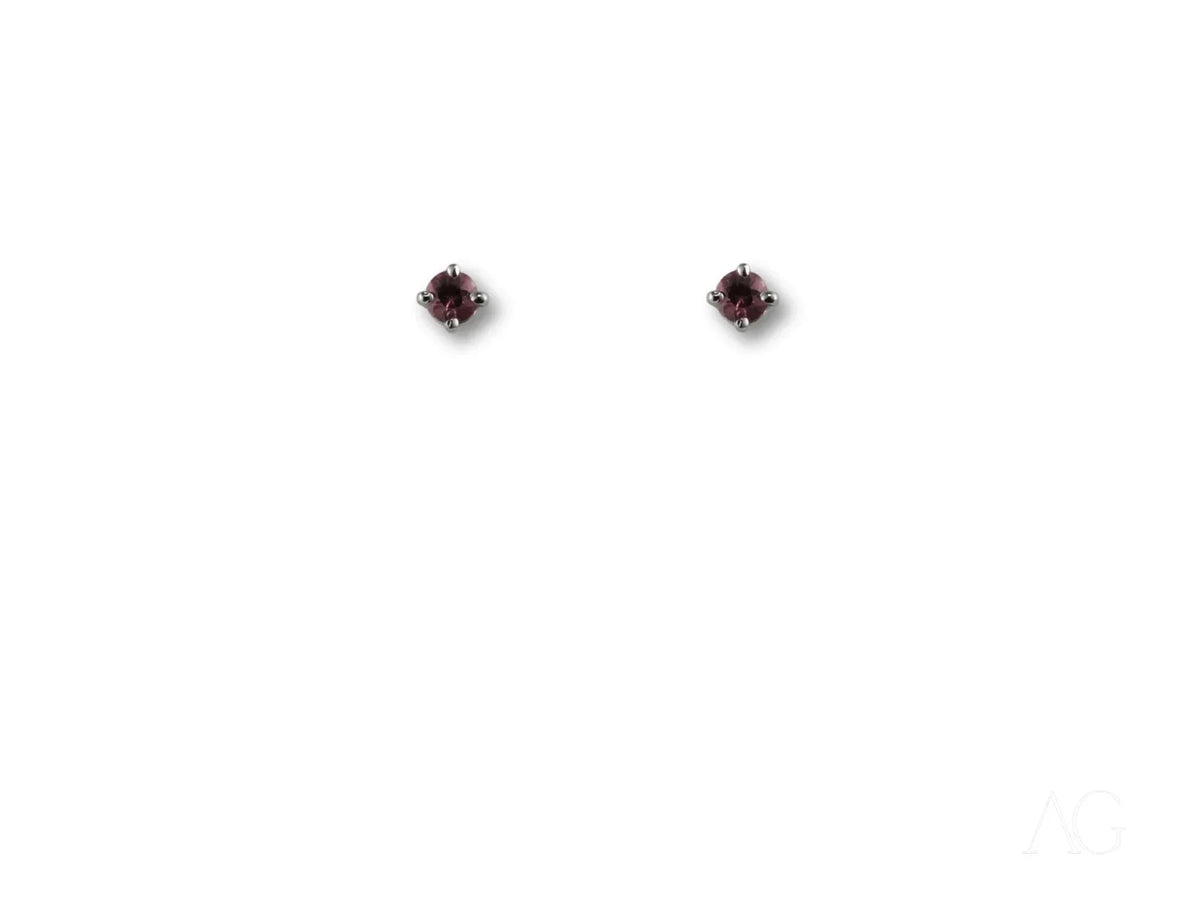 White gold tourmaline earrings with deep red gemstone studs