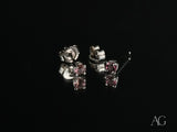 Pair of white gold tourmaline earrings with purple gemstones