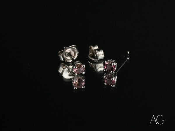 Pair of white gold tourmaline earrings with purple gemstones