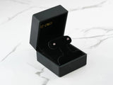 Gleam & Grace white gold tourmaline stud earrings in open black box