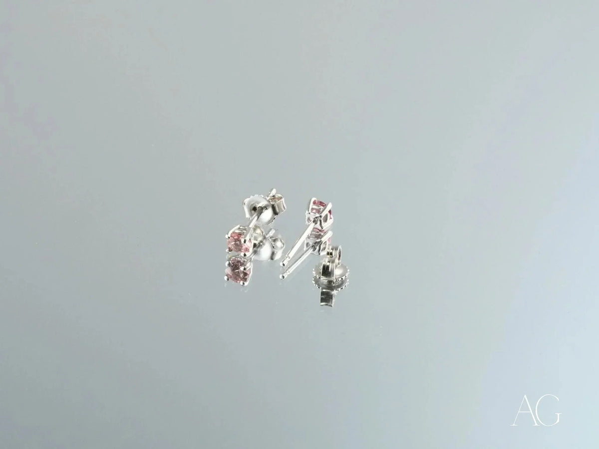 Four white gold tourmaline earrings with pink gemstones