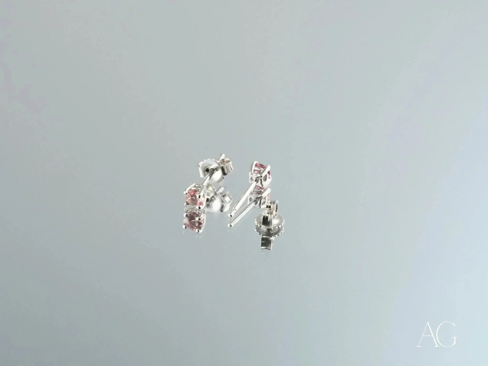 Four white gold tourmaline earrings with pink gemstones
