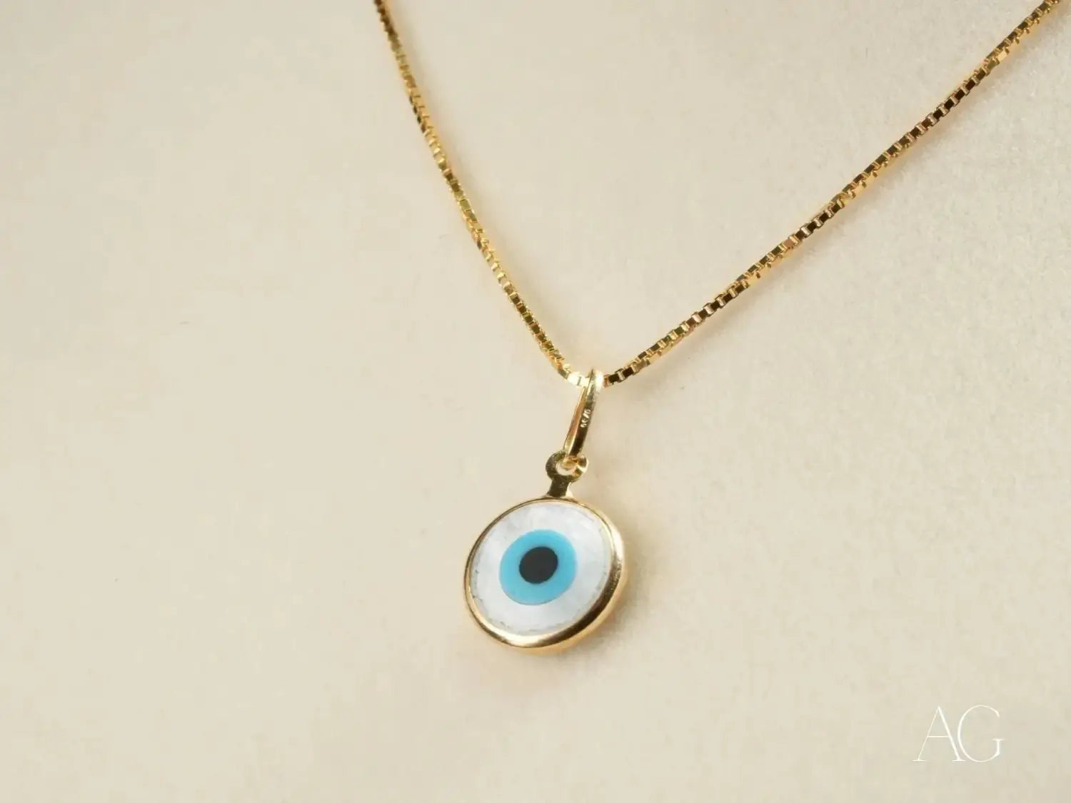 Boucheron 18k art gold jewelry with blue white evil eye pendant