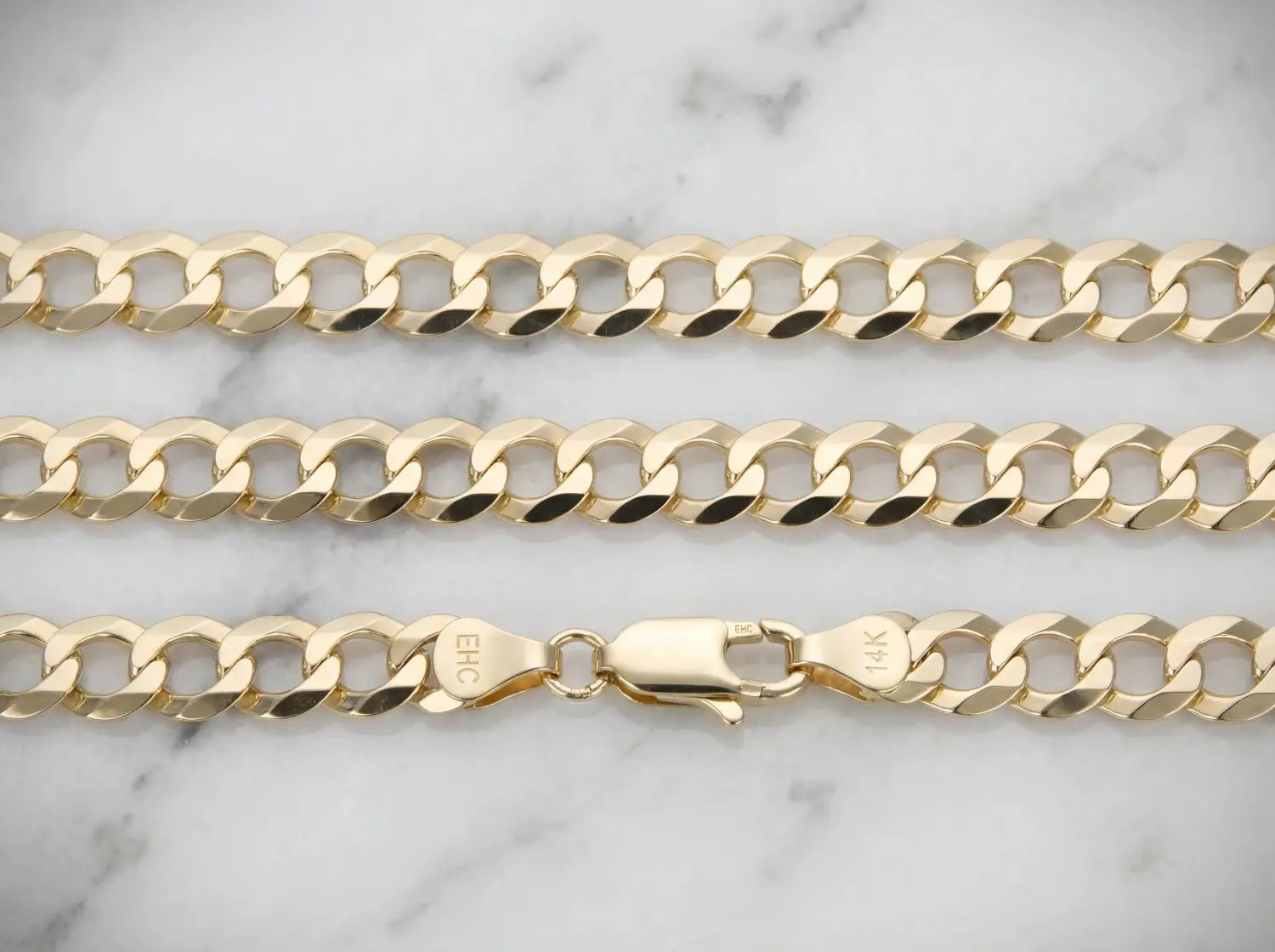 gold-toned paperclip-style chain bracelet showcasing unique gold chain styles in art gold jewelry trends for millennials