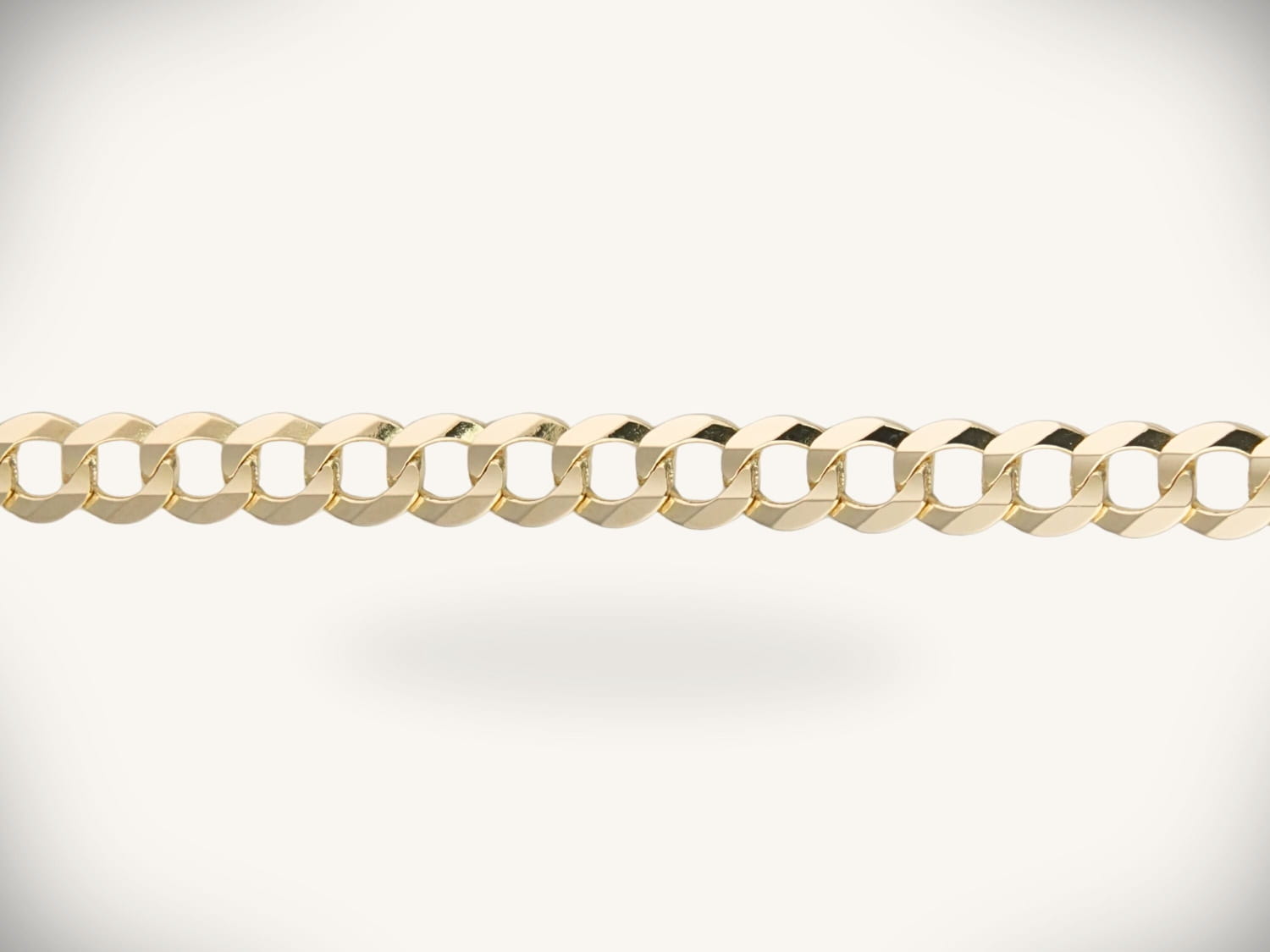 Stunning 18k gold curb link chain in art gold jewelry treasure.