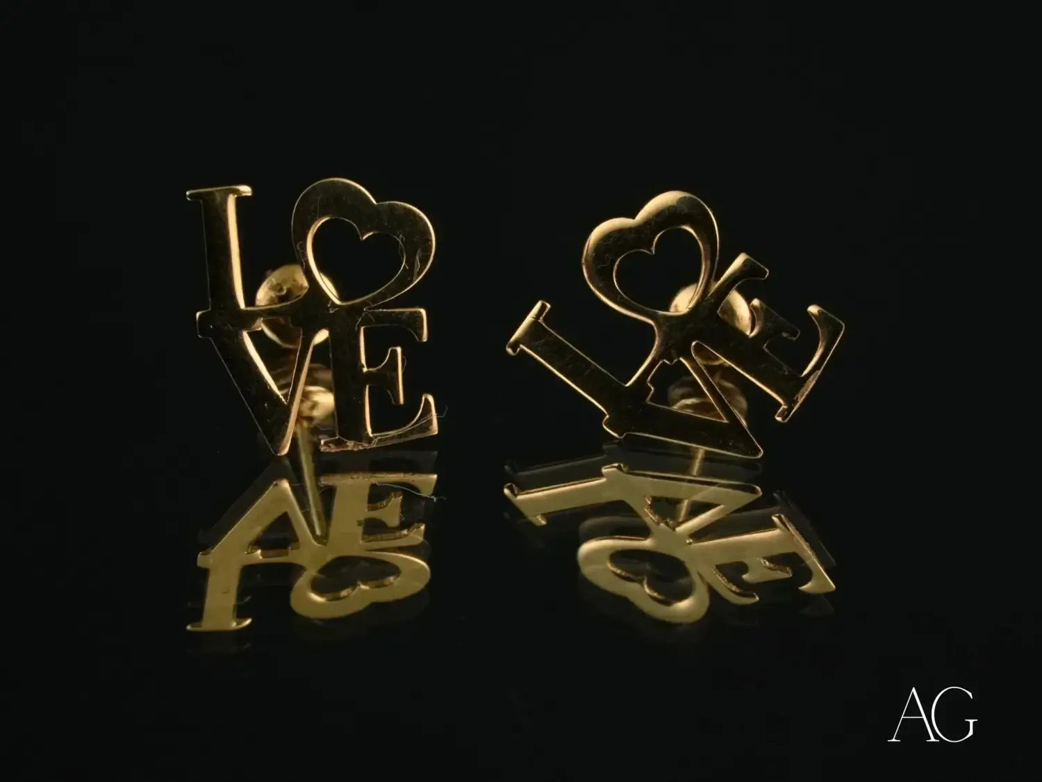 Stunning 18k gold love letter stud earrings with heart cutouts