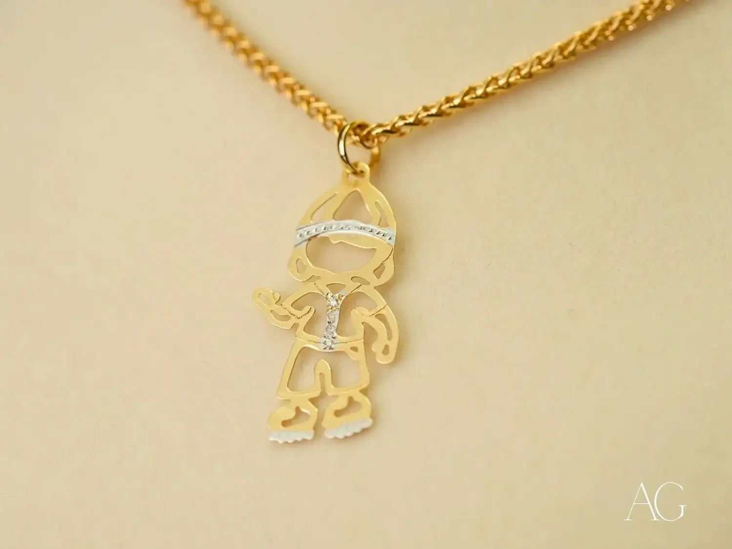 Stunning 18k gold child figure pendant in fine art gold jewelry