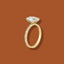 A gold engagement ring with a large, clear diamond and a pavé diamond band.
