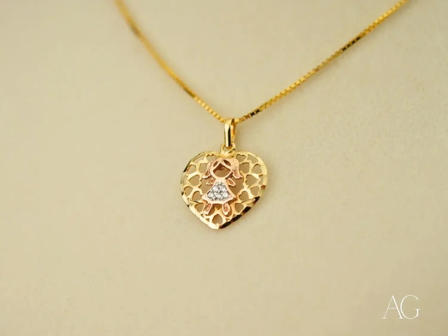 Golden H Doll: Gold Doll Pendant