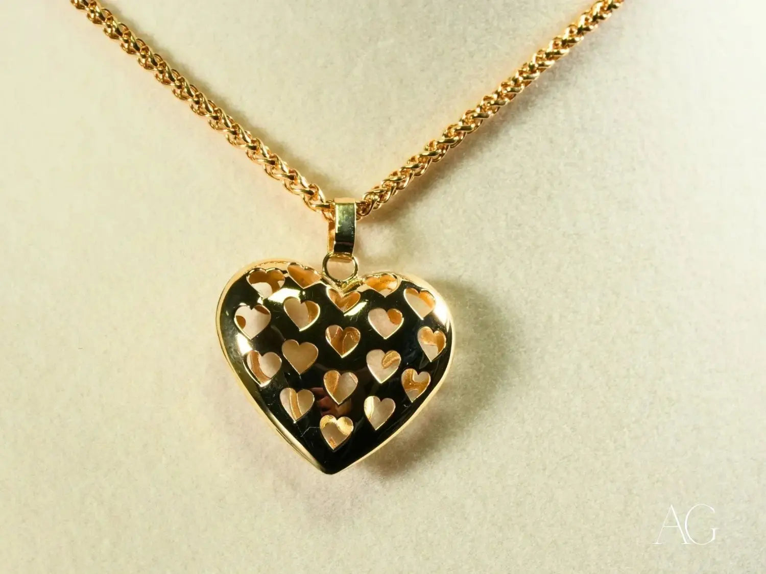 David Yurman 18k gold heart pendant necklace with cut-out hearts