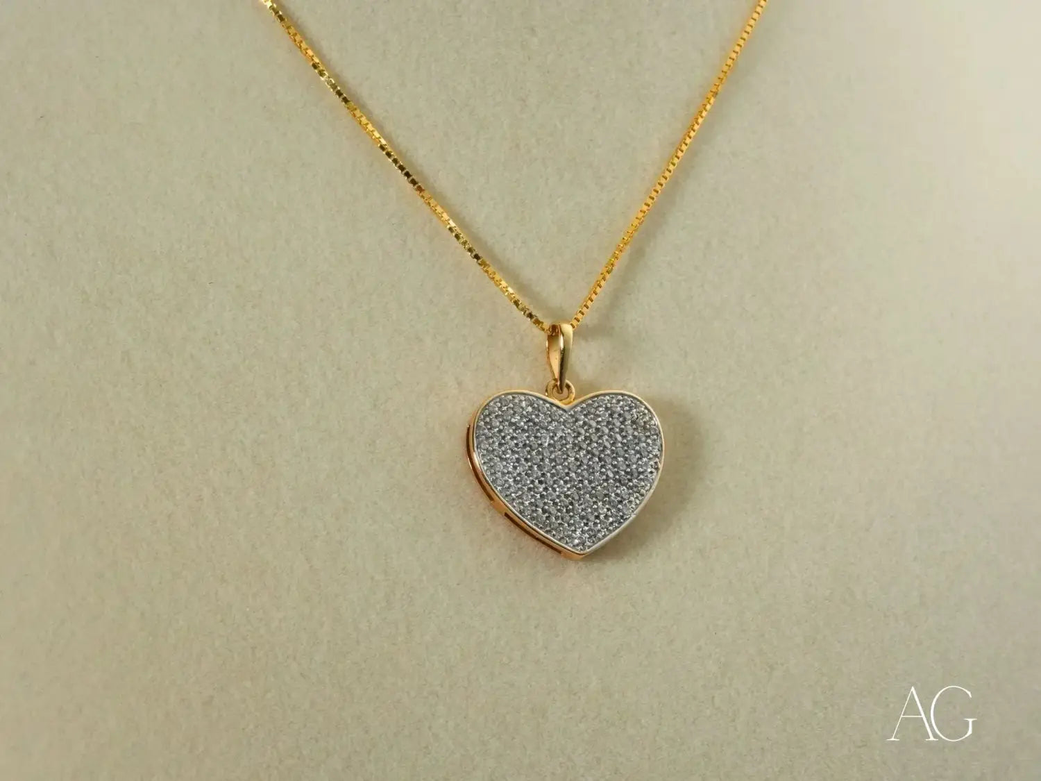 Gold heart-shaped 18k pendant with pave clear stones, art gold jewelry.