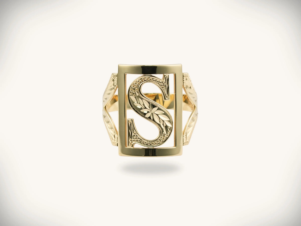 Elegant 14k gold initial letter ring with monogrammed S and leaf design