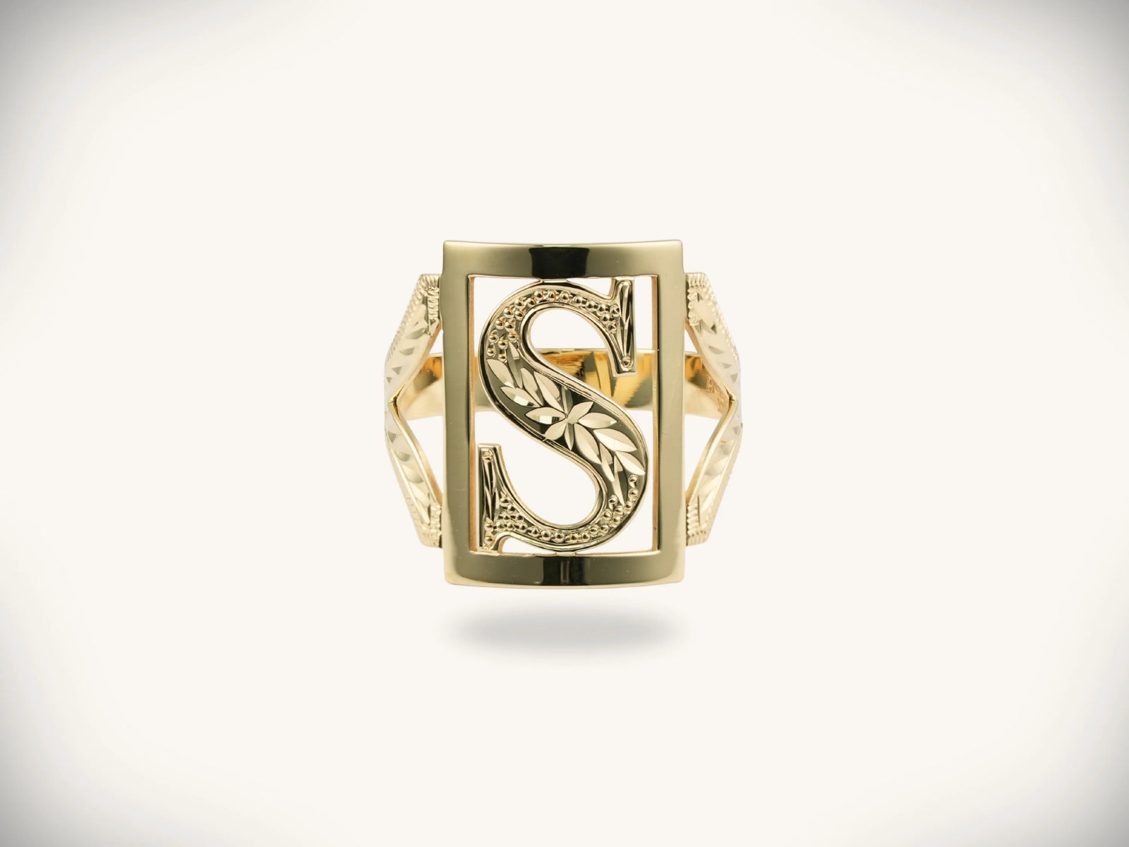 Elegant 14k gold initial letter ring with monogrammed S and leaf design