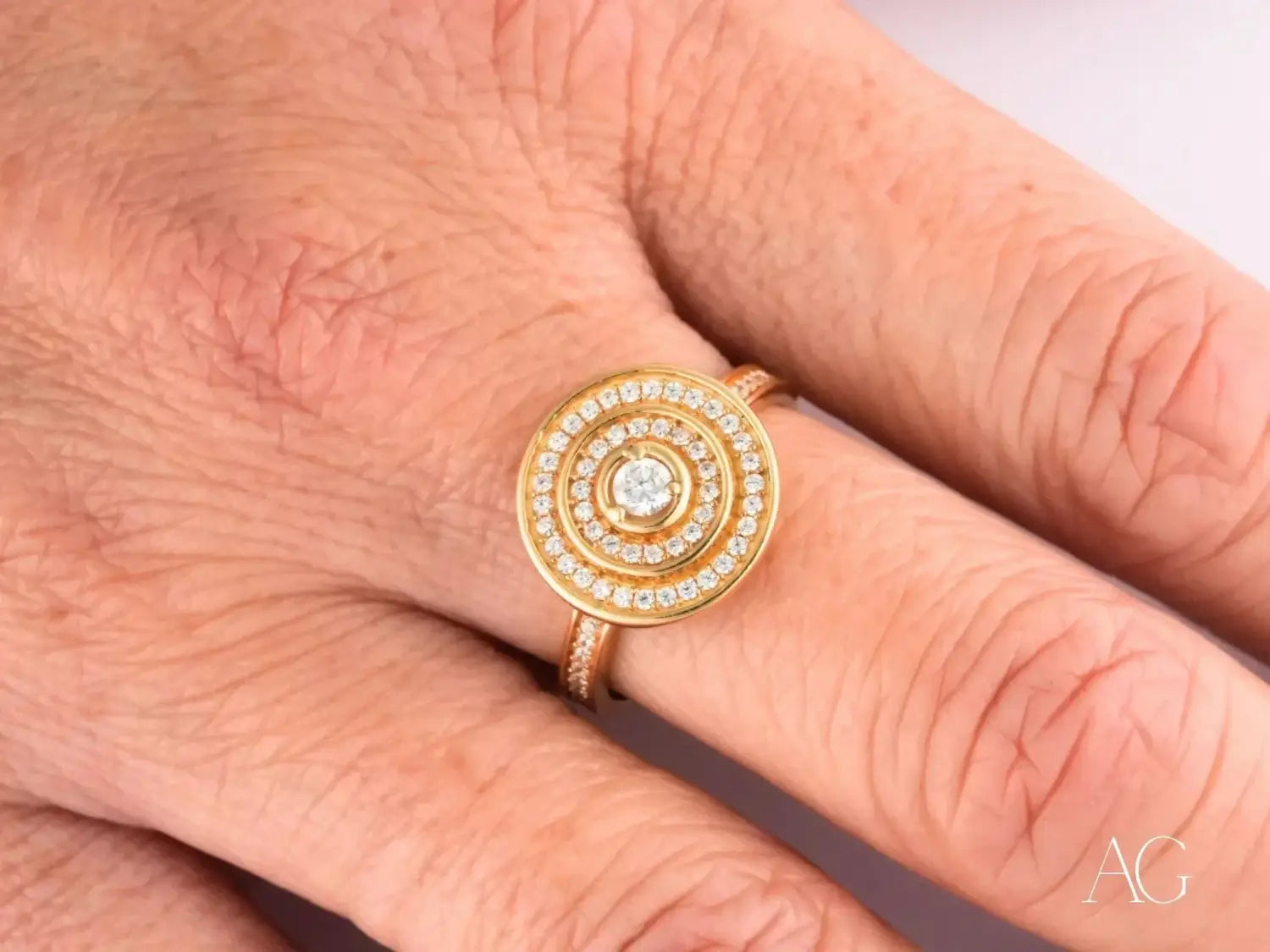 Handmade 18k gold engagement ring with diamond concentric circles