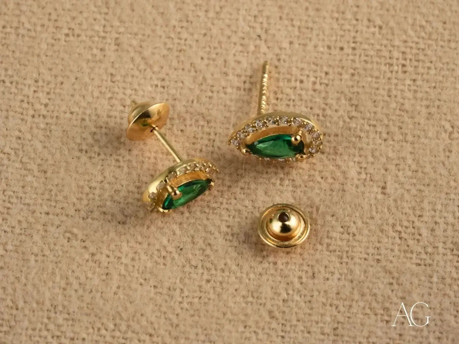 Art nouveau-style gold jewelry set with enamel featuring intricate floral bird and organic forms in jewelry history.