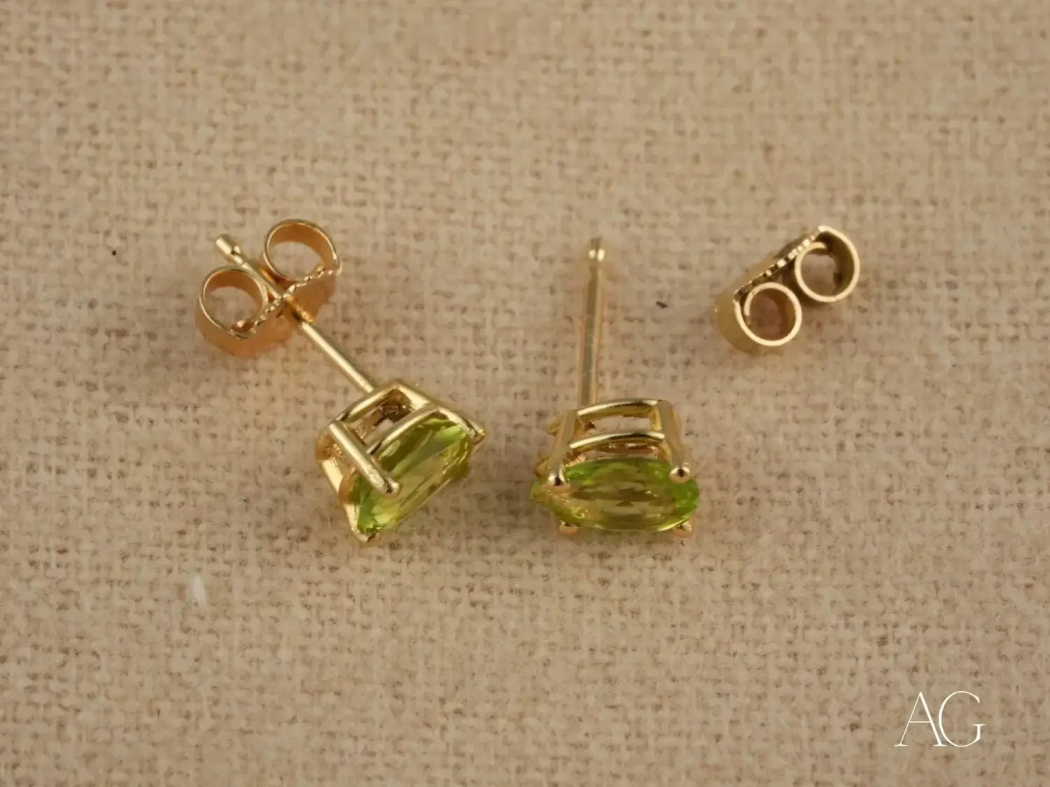 Peridot Radiance: 18k Gold Pear-Shaped Earrings