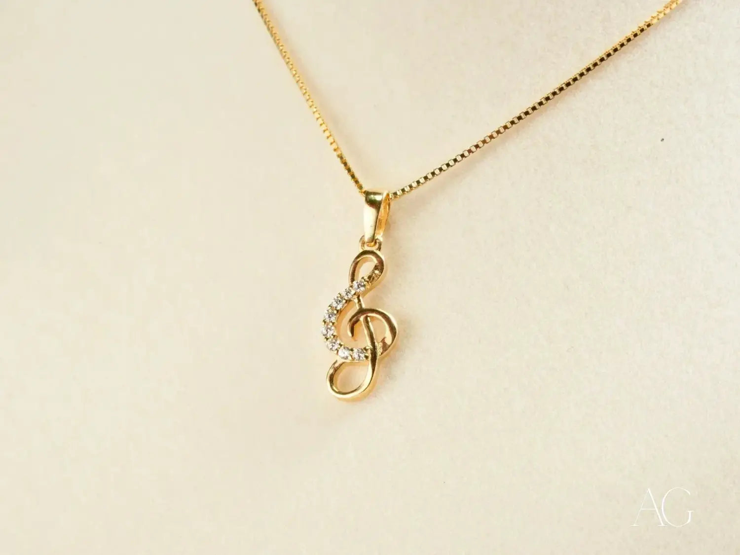 Gold-tone treble clef necklace in fine jewelry for engagement rings