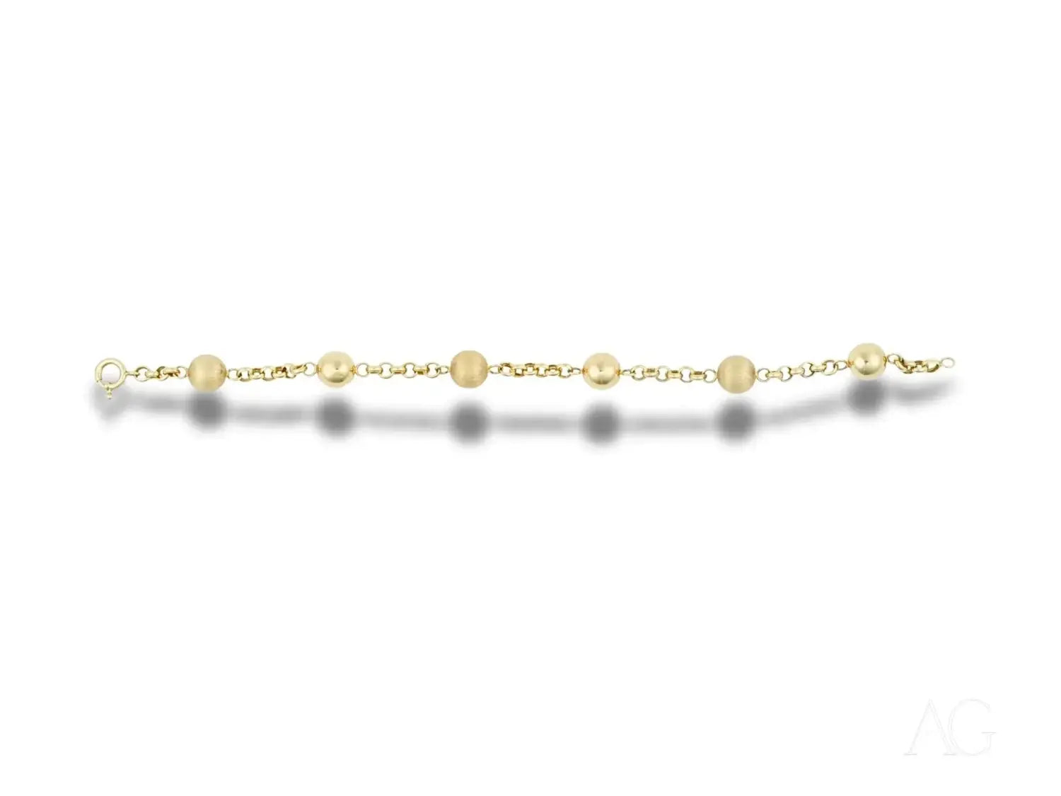 Timeless 18k gold jewelry bracelet with pearl-like beads on delicate chain