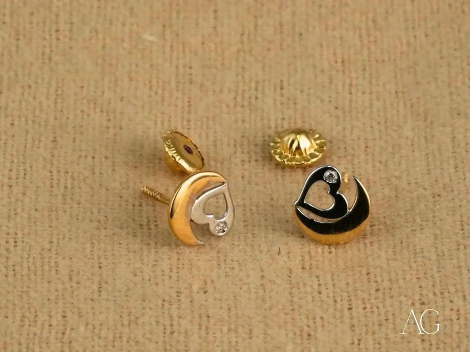 Handmade gold heart-and-moon stud earrings with enamel accents