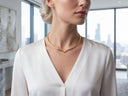 Gold-toned minimalist choker necklace with a sleek, modern v-shaped design
