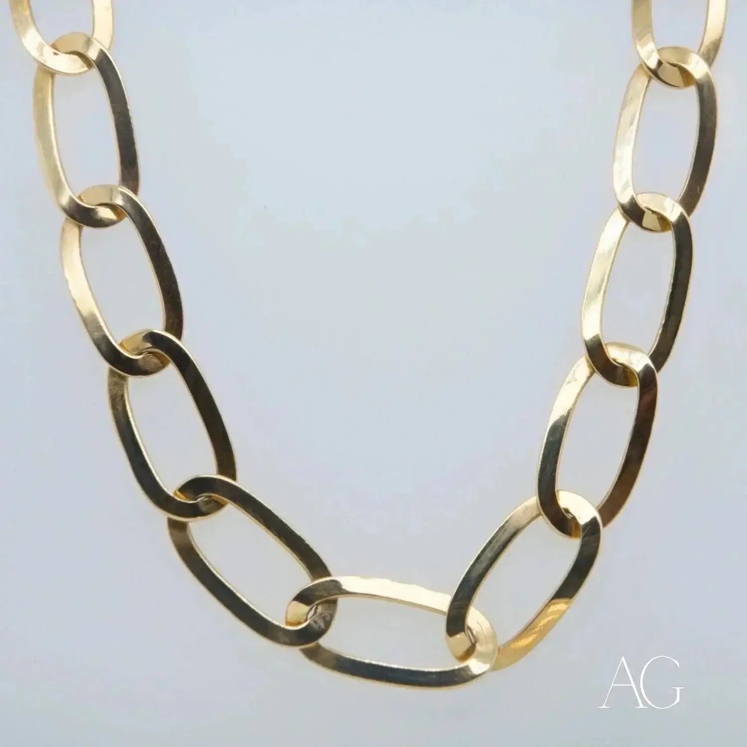Gold-toned chain necklace featuring heart-shaped pink enamel pendant and octagonal locket charm ideal for 18k gold jewelry gifts.