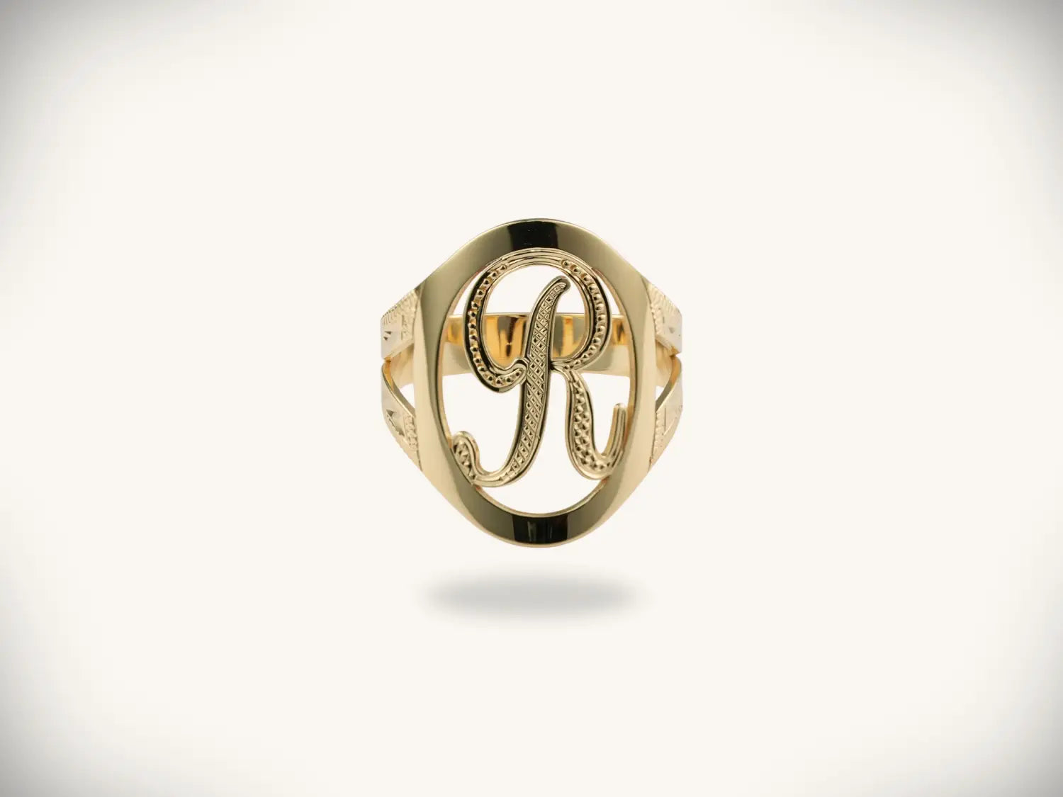 Gold-toned monogrammed r ring, luxury jewelry with ornate engraving