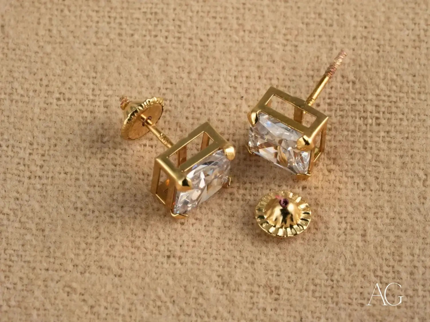 Van Cleef gold-toned stud earrings with square-cut clear crystal in geometric frame