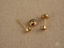 Golden Brilliance 18k gold CZ round stud earrings with screw-back posts
