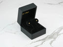 Open 18k gold CZ round stud earrings in black velvet box