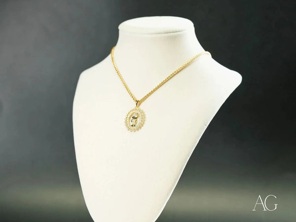 Golden Charm 18k gold CZ boy pendant with diamond E oval