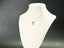 Golden charm doll pendant featuring a sparkly teddy bear for art gold jewelry enthusiasts