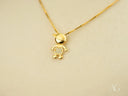 Golden charm doll pendant: boy design with diamonds in art gold jewelry