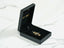 Black velvet jewelry box with a golden cherish pendant featuring 18k solid gold art gold jewelry