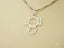 Silver girl pendant on delicate chain showcasing art gold jewelry in 18k solid gold yellow or white gold