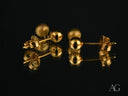 Pair of 18k gold ball drop earrings: smooth and brushed gold duo