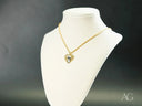 Golden Elegance 18k solid gold heart pendant with clear gemstones