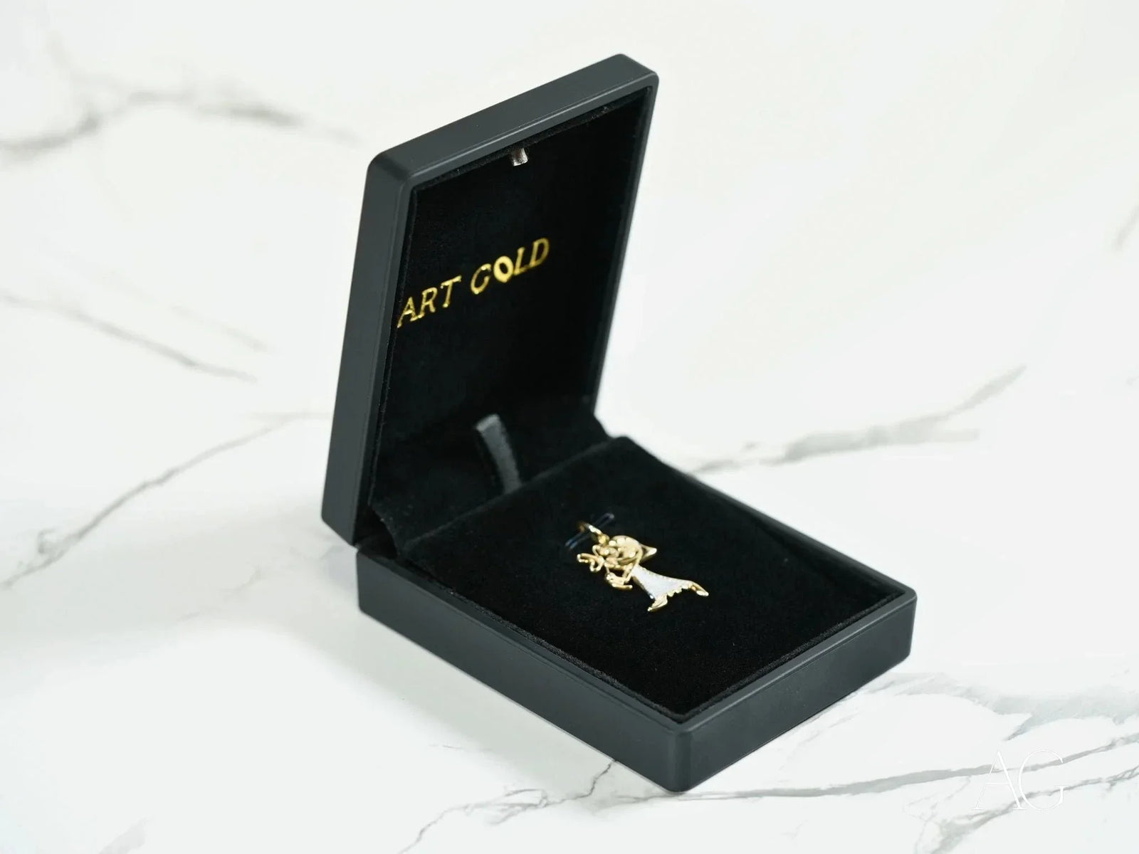 Open 18k solid gold doll charm in black jewelry box
