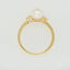 Lustrous 7mm pearl ring with diamond accents from Golden Elegance redefining elegance