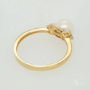 Golden Elegance: Stunning 7mm Pearl Ring with Diamond Accents