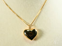 Golden Embrace heart pendant in polished art gold jewelry