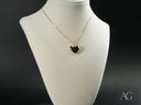 Golden Embrace heart pendant in art gold jewelry