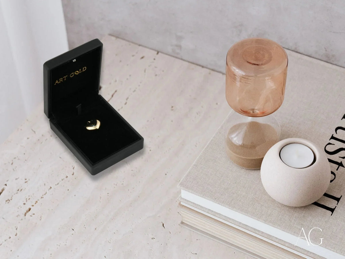 Golden Embrace heart pendant in black velvet box, art gold jewelry