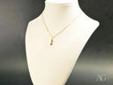 Golden flip flop pendant necklace in art gold jewelry