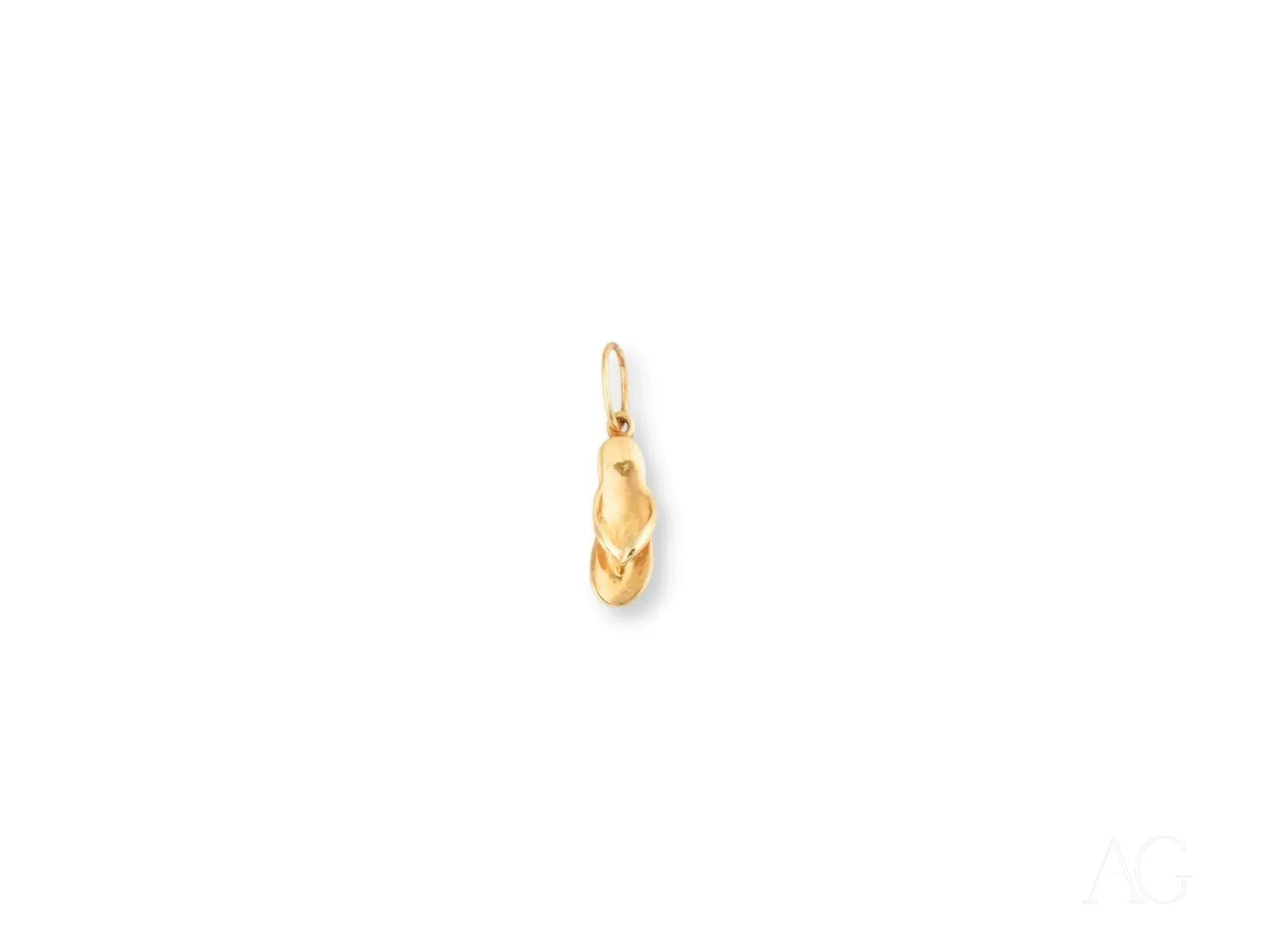 Polished golden flip flop pendant in art gold jewelry