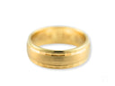 Golden Fortress brushed gold wedding band with hammered edges