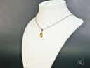 Golden Glow Citrine Pendant in 18k white gold with teardrop yellow gem