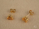 Pair of 18k gold citrine stud earrings with pear-cut citrine gemstones